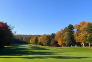 Golfers on a vibrant autumn golf course in Fairhill, Pennsylvania