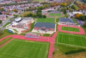 A vibrant scene depicting Central Bucks high schools' athletic teams in action with community support.