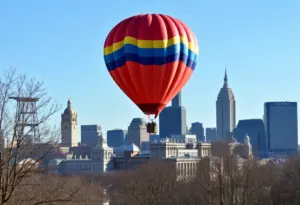 Hot air balloon flying over Philadelphia skyline