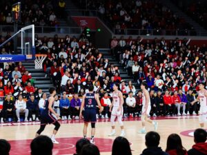 Exciting basketball game with fans cheering for La Salle Explorers.