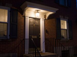 Illuminated front porch door in Manayunk, Philadelphia