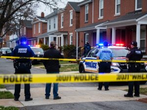 Police investigating a shooting scene in Southwest Philadelphia.