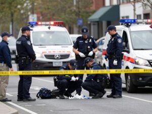 Police at a crime scene in Wilmington after a shooting