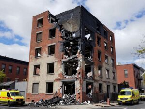 A four-story burned apartment building in North Philadelphia