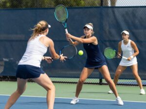 University of Pennsylvania women's tennis team celebrating a victory